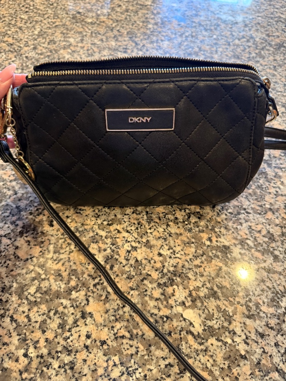 DKNY Black Leather with Gold tone hardware crossbody bag